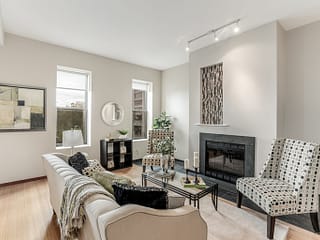 After shot of room that has been staged and painted with Sherwin Williams LivingWell paint