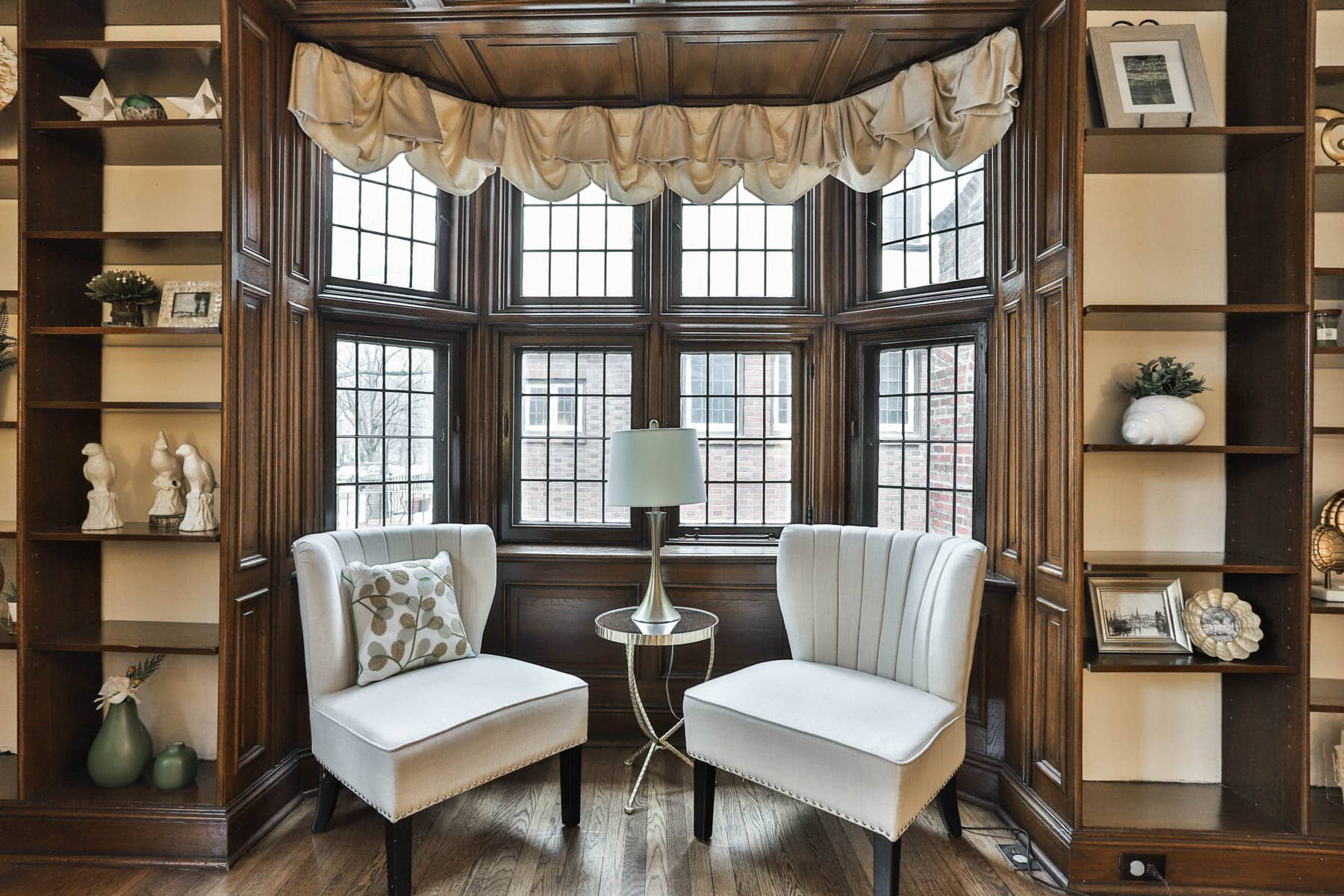 Westgate home - sitting area with shelves nearby